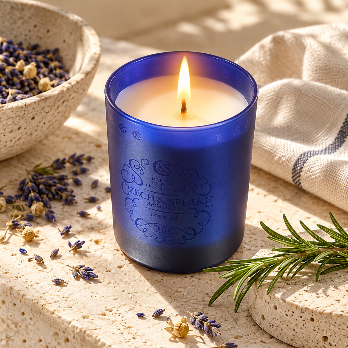 Czech & Speake Oxford & Cambridge Candle in a decorative glass jar with a white wax interior and elegant design.